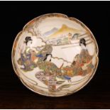 A Satsuma Export Bowl decorated with three geisha girls to the interior with two character marks to