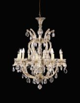 A Large Glass Ten Branch Chandelier hung with faceted tear drop pendants, 40" (102 cm) in length,