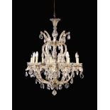 A Large Glass Ten Branch Chandelier hung with faceted tear drop pendants, 40" (102 cm) in length,