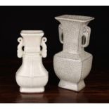 Two Chinese Celedon Crackle Glaze Vases of archaic form measuring 9" (23 cm) and 7¼" (18.