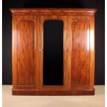 A Fine Victorian Mahogany Triple Wardrobe.