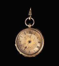 A Ladies 18K Gold Pocket Watch engraved with elaborate foliate decoration.