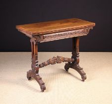 A Burmese Colonial Carved Padouk Fold-over Card Table.
