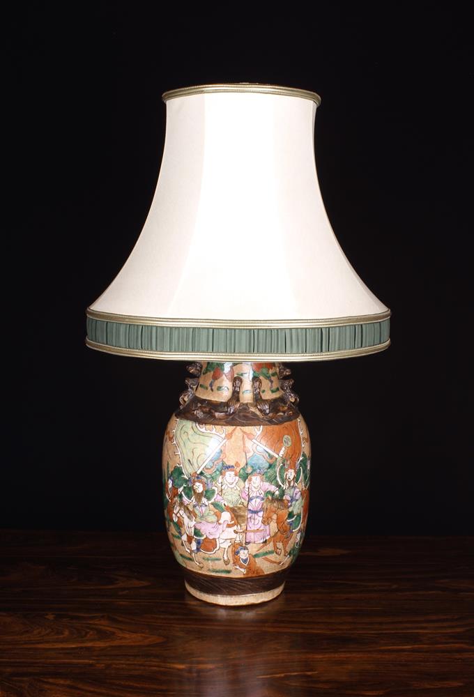 A Famille Vert Style Pot Lamp: The baluster vase enamelled with a battle scene and having an