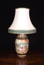 A Famille Vert Style Pot Lamp: The baluster vase enamelled with a battle scene and having an