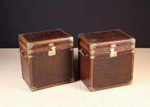 A Pair of Leather Bound Crocodile-skin Travelling Trunks.