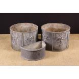 A Pair of Round Lead Planters cast with celestial figures to the sides, 12" (30 cm) high,