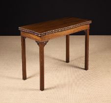A Chippendale Style Mahogany Fold-over Card Table.