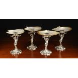 A Set of Four Ornate Silver Plated Shell-topped Tazze.