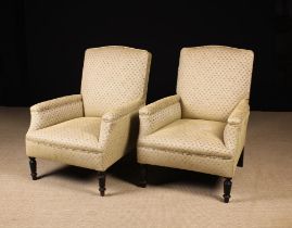 A Pair of Upholstered Armchairs covered in a mustard & grey fabric woven with repeated diamond