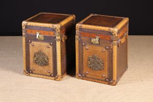 A Pair of Leather Bound Copper Clad Travelling Trunks.