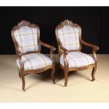 A Pair of Carved Walnut Fautieul Armchairs.