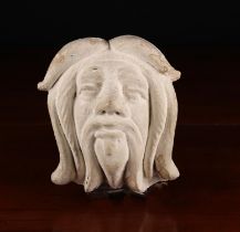 A Plaster Cast Wall Mounted Head of a bearded man, approx 7½" (19 cm) high, 6" (15 cm) wide,