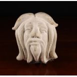 A Plaster Cast Wall Mounted Head of a bearded man, approx 7½" (19 cm) high, 6" (15 cm) wide,