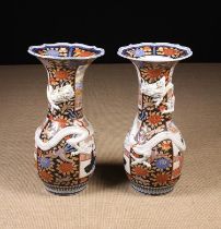 A Pair of Large 19th Century Japanese Baluster Vases with outflared serpentine edged rims.