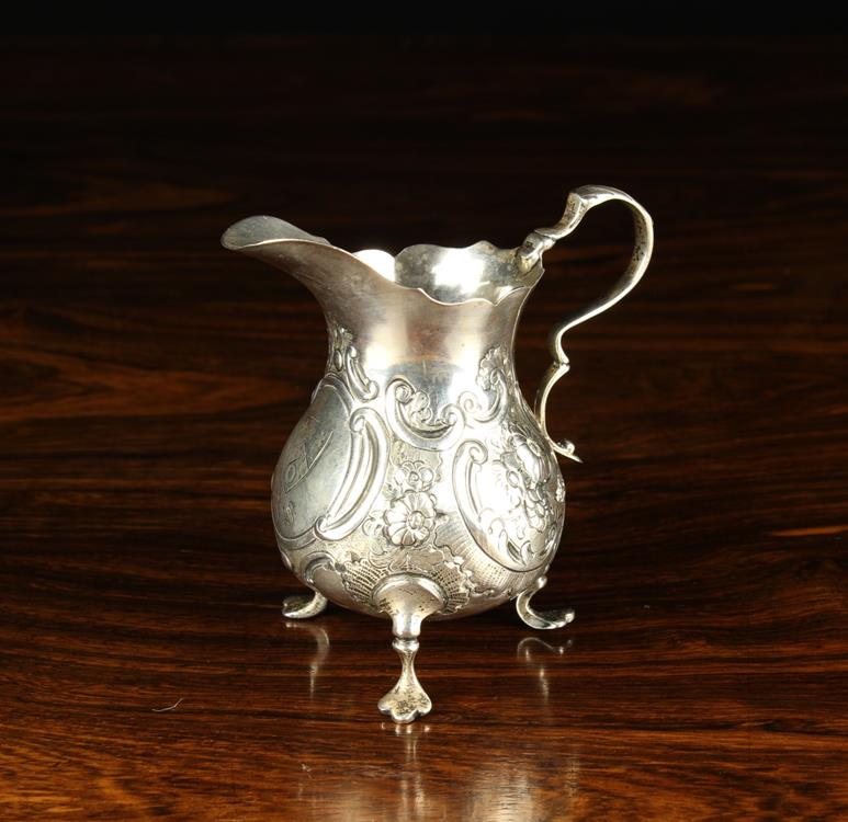 A Small Victorian Silver Jug with London hallmarks for 1876,