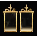 A Pair of Louis XVI Style Gilt Wall Mirrors.