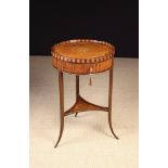 A Small Edwardian Inlaid Satinwood Drum-topped Work Table.