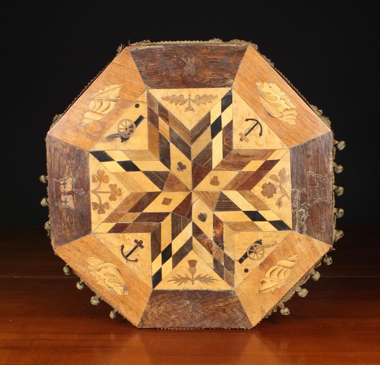 A Jamaican Style Octagonal Marquetry Table Top inlaid with a geometric star design to the centre