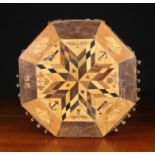 A Jamaican Style Octagonal Marquetry Table Top inlaid with a geometric star design to the centre