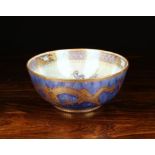 A Wedgwood Lustre Bowl decorated in fine line gilding with chinoiserie dragons to the turquoise