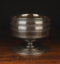 A Late 17th/Early 18th Century Turned Treen Wassail Bowl having a dark patinated finish.