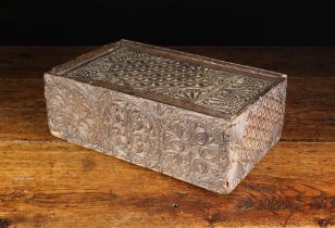 A 17th Century Welsh Chip Carved Box of boarded construction,