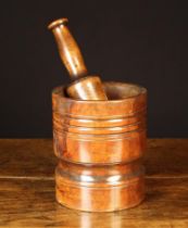 An 18th Century Turned Lignum Mortar 6¼" (16 cm) high, 5½" (14 cm) in diameter,