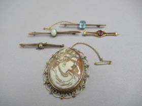 Four 9ct (hallmarked) bar brooches and a 9ct (hallmarked) cameo brooch