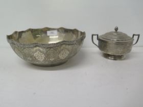 A Middle Eastern silver bowl (hallmarked and tested) finely chased decoration - approx 21cm diameter