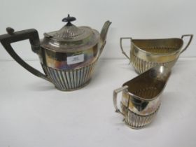 A silver three piece tea set - James Dixon & Sons, Sheffield 1923 - teapot approx 25cm x 15cm -