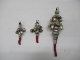 A Victorian silver baby's rattle, Birmingham 1885, 16cm, together with two smaller rattles