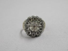 A Georgian white paste cluster ring, yellow and white metal - scroll work to shoulders - ring size