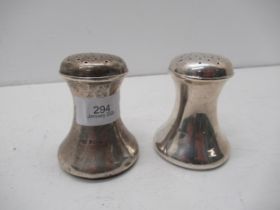 A pair of silver salt and pepper shakers, Birmingham 1911, approx 7cm, approx 3.2 troy oz