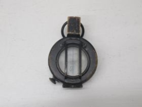 A WWII military type compass, working in saleroom
