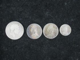 Four 19th century English silver coins - 1819 Crown, 1887 1/2 Crown (VF), 1890 1/2 Crown and 1887