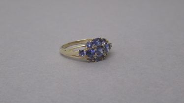 A 9ct yellow gold tanzanite and diamond ring - head size approx 16mm x 9mm - ring size approx O/P
