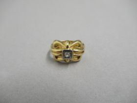 An 18ct yellow gold hallmarked diamond ring, size L/M, approx 2.2 grams