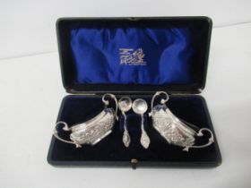 A boxed pair of silver salts - John Millward Banks, Birmingham 1896 - with matching spoons and