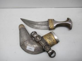 A silver and gilt mounted Omani Khanjar dagger with horn handle - good overall condition, curved