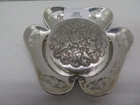 A silver caster, London 1920, approx 13cm and a Middle Eastern silver box and cover, approx 7.5cm,