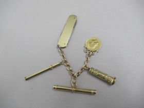 A 9ct hallmarked chain with a 1915 gold sovereign, a 9ct (tested) pencil and case, a 9ct