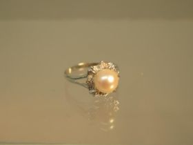 An 18ct white gold (hallmarked) Akoya pearl ring size S - weight approx 3.6 grams
