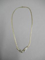 A 10ct yellow gold (hallmarked) necklace with diamonds - 43cm - approx weight 9.2 grams