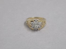 A 14ct yellow gold hallmarked diamond cluster ring, size L/M, approx 4.5 grams