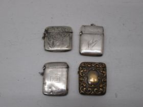 Three silver hallmarked vesta cases and one metal