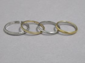 Four wedding bands - 22ct bi colour gold (hallmarked) ring size J - weight approx 2 grams - an