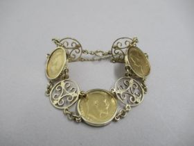 A three gold sovereign bracelet, 1893, 1908 and 1913 set in 9ct yellow gold, total weight approx