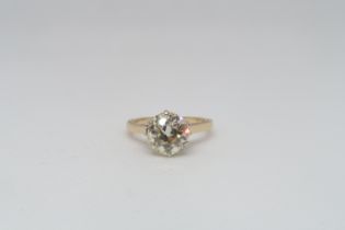 An impressive 2.10ct diamond solitaire ring - The old brilliant cut diamond set in 14ct yellow