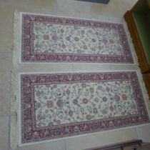 A pair of Belgium rugs - 65cm x 135cm